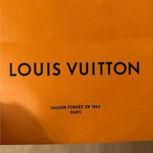 Louis Vuitton Brown Checkered wallet with added gold chain and acrylic chain